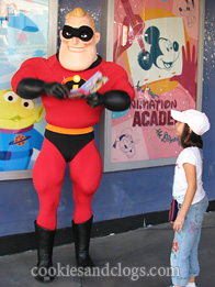 Mr. Incredible signing an autograph in Disney California Adventure Park near Disneyland