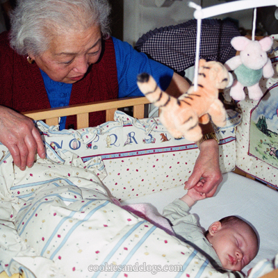 Great-grandmother meeting her great-granddaughter for the first time